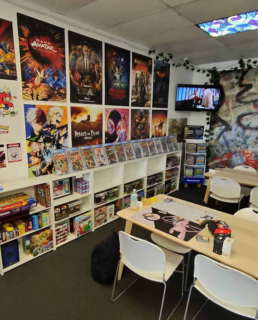 Play area with anime posters and board games